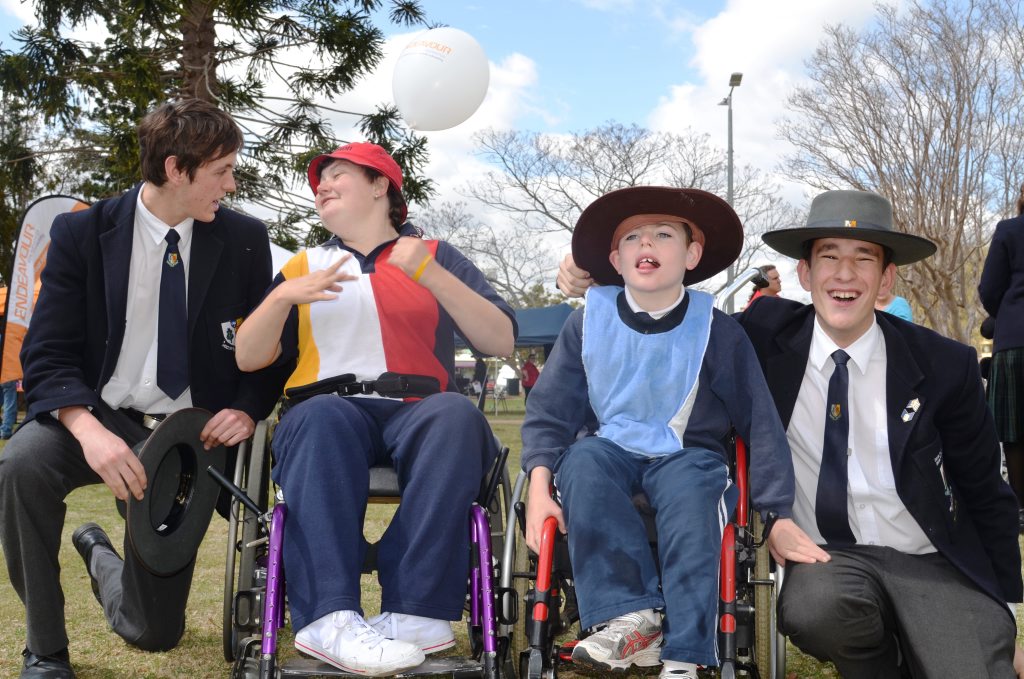 FORGING BONDS: Scots PGC College student Jack McCulloch with his buddy Maddy Creed from Warwick State High School and Cody Bergemann from Warwick East State School with his Scots Buddy Dominic Andersen-Strudwick at the Disability Week Fun Day last year.